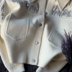 Sparkle in Style – White Cropped Jacket with Sequin Details
