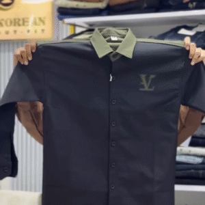 Bold & Contemporary – Black Short-Sleeved Shirt with Green Collar and "V" Logo