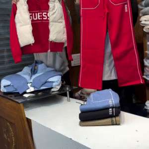 Bold & Coordinated – Red Guess Apparel Set with Hoodie, Sleeveless Puffer Vest, and Sweatpants