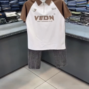 Modern Street Style – VEDN Club Graphic Half-Zip Polo with Grey High-Rise Denim Jeans